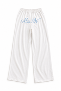Personalised embroidered white beach style trousers